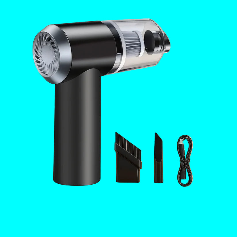 Black handheld vacuum cleaner with attachments on a wooden surface